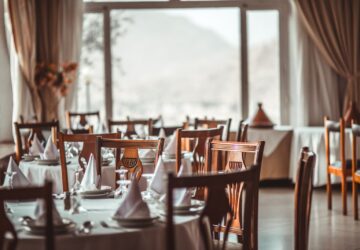 brown wooden dining set inside room